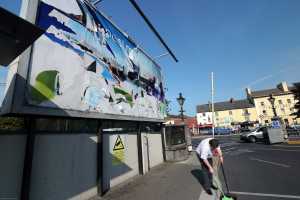 5-6-13 Irish Examiner Bill Board vandalized at Colbert Station
