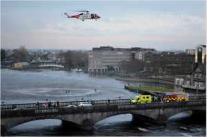 The heroic events of last Saturday' rescue by Eli Brace and the Shannon based Irish Coast Guard helicopter Rescue 115 captured from an elevated perch on O'Callaghan's Strand by local amateur photographer Peter MacNamara