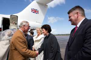 19/5/2015 REPRO FREE Britain's Prince Charles greets Rose Hynes and Neil Pakey, Shannon Group when he and his wife Camilla arrived at Shannon airport ahead of their official visit to Ireland. . Pic Sean Curtin Fusionshooters.