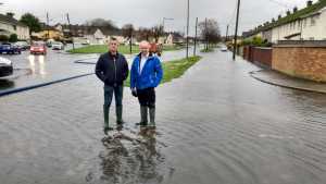 Sinn Fein councillors Maurice Quinlivan and Malachy McCreesh on Hyde Road.