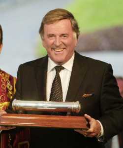TWO of LimerickÕs most famous sons Ð Sir Terry Wogan (pictured above) and  Dr Tom Ryan Ð were conferred with Honorary Freedom of the City at a special ceremony in City Hall, Limerick last Friday night.  A delighted Mr. Wogan is pictured above with his parchment following the ceremoney.  Picture: Press 22    EuropeÕs top radio broadcaster and the renowned portrait artist were  presented with the highest honour Limerick can bestow on a citizen at a specially convened meeting of Limerick City Council.   They now join the list of other high profile recipients of this rare title including:  former US Presidents John F Kennedy and Bill Clinton; Pope John Paul 11 and successful Limerick businessman JP McManus.     Conferring the Honorary Freedom of the City on both men, Mayor of Limerick Cllr Joe Leddin said it is reserved for well known statesmen who have made a unique contribution to the common good or natives who have brought credit to the city by their contribution to the common good.