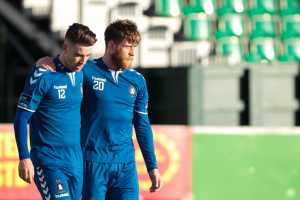 Garbhan Coughlan (left) is congratulated by Chris Mulhall after opening the scoring for Limerick FC against Cabinteely on 16 April. Photo credit: Conor Wyse.