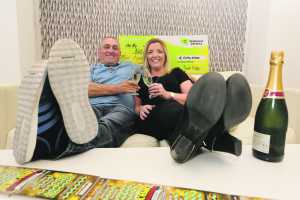 Natalie Owens and her husband James celebrate their €500,000 scratch card win.