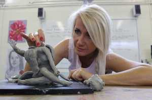 Karolina Szymanska with clay sculpture, who has been offered a place at National College of Art and Design