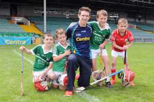 4/7/2015  Children from local Limerick hurling clubs attended one of Centras Champions of Healthy Living summer tour events with hurling stars Declan Hannon and Seamus Hickey in the Gaelic Grounds, Limerick. The children were treated to a very special hurling skills session with the two county stars and also got an insight into the nutrition and diet of a champion as Centra look to spread their healthy living message across Ireland through community events taking place throughout the summer. Attending the event were Peter Scully, Conor Gavin, Cian Scully and Harry McDermott, Monaleen, with Limerick Hurler Seamus Hickey. Pic: Gareth Williams / Press22