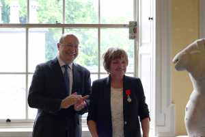 His Excellency Ambassador Thebault with Marie on June 25 when honours were conferred