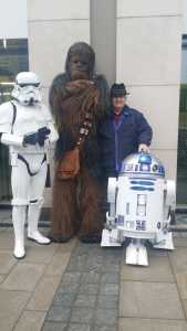 David O'Brien with his R2-D2 robot and other Star Wars pals.