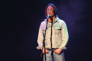 Daniel Taylor as John Lennon in Lennon - Through a Glass Onion which comes to UCH, Limerick on September 17th. copy