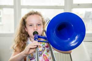 Young Hannah Guerin, aged 9,  blowing off the trombone blues Pic: Caleb Purcell Photography