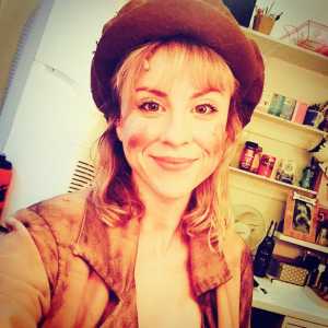 Mired in greasepaint as Eponine, "a street urchin in love"