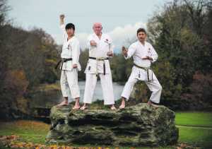 Noel Casey, centre, head instructor for JKA Ireland with Mr Naka, left, general manager JKA HW Japan and Mr Okuma, right, director of International Affairs JKA HQ Japan.