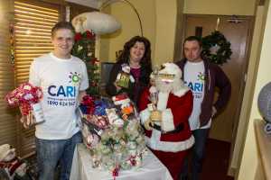 Shane Kiely, Mary Madden and Derrick Towell of CARI getting organised for the Christmas pop-up shop on Bedford Row this weekend.