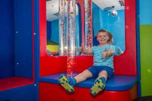 Cian Meaney playing in the new sensory room at Dochas Limerick