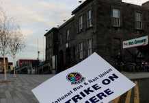 Strike placard at Colbert Station
