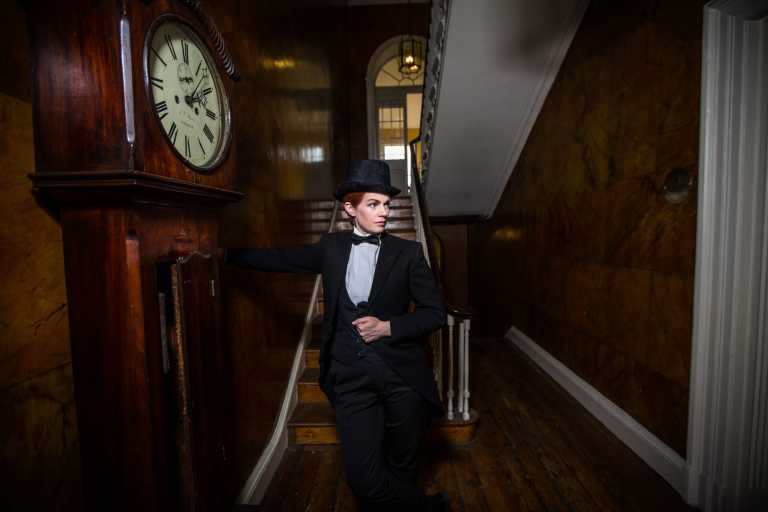 Woman to man: Jean McGlynn sings in suits