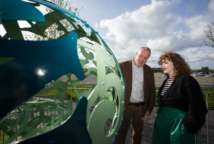 Pictured at the event were, tutor and artist blacksmith, Eric O'Neill with Jenny Gilleece who's partner Patric Salo had worked on the project before sadly passing away. Picture: Alan Place