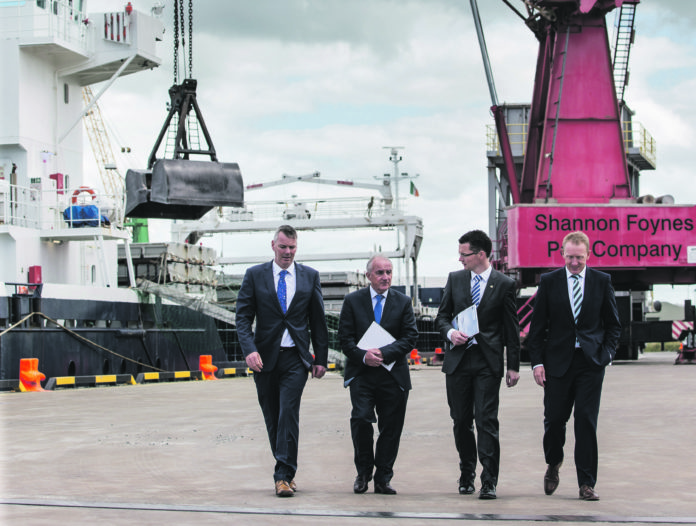 Shannon Foynes Port Company chief executive Pat Keating, Chairman Michael Collins, Minister of State Patrick O'Donovan and Mark O'Connell, W2 Consulting at the Foynes Port. Picture Cathal Noonan True Media.