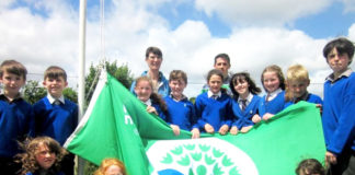 Kilcornan Tidy Towns chairperson Lyn Nolan and Limerick hurler Darragh O’Donovan with members of the Kilcornan national school's Green Schools committe.