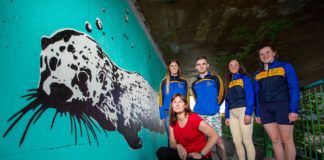 Pictured at the unveiling of the Mural were, Mary Conroy, Artist with St. Michaels Rowing Club volunteers who helped with the project, were, Cara MacMahon, Jack McKeown, Asia O'Brien and Ciara Marron. Picture: Alan Place