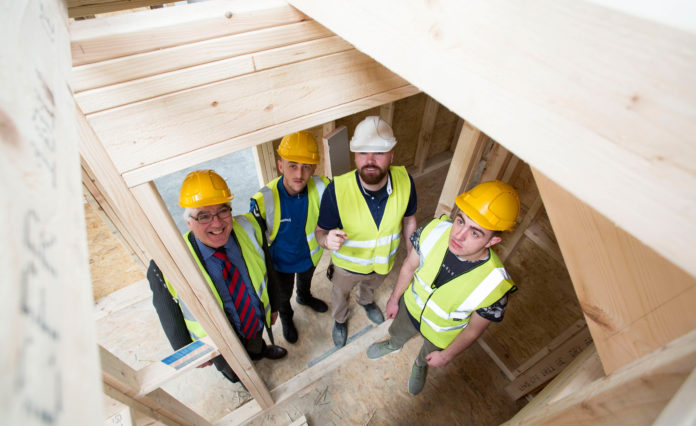 LCETB CEO George O'Callaghan with Clenn's Patrick Benn and LCETB Trainees Liam Keane and Damien Quinn in a house under construction. Picture: Alan Place