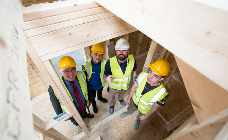 LCETB CEO George O'Callaghan with Clenn's Patrick Benn and LCETB Trainees Liam Keane and Damien Quinn in a house under construction. Picture: Alan Place