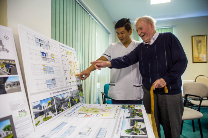 Airoe Valencia, Nurse at St Camillus Community Hospital, with Michael McInerney, Resident. Pic: Cian Reinhardt