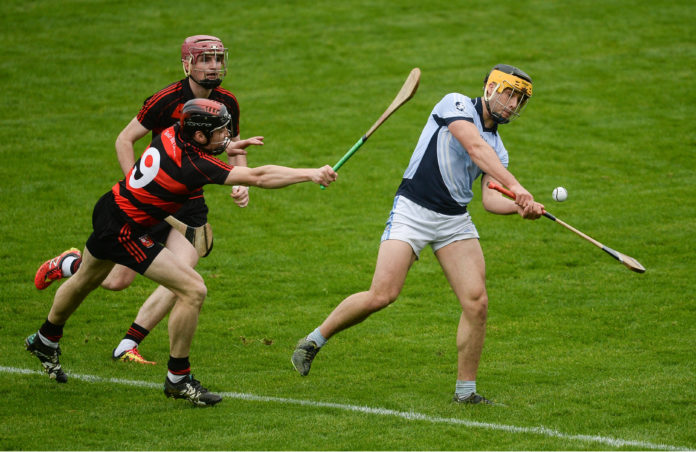 Tommy Grimes of Na Piarsaigh in action against Shane O'Sullivan and Billy O'Keeffe of Ballygunner, behind, during the AIB Munster GAA Hurling Senior Club Championship Final match between Na Piarsaigh and Ballygunner at Semple Stadium in Thurles, Co Tipperary. Photo by Piaras Ó Mídheach/Sportsfile