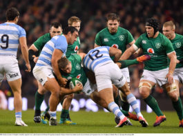 Jordan Larmour of Ireland is tackled by Agustin Creevy and Jeronimo de la Fuente of Argentina during the Guinness Series International match between Ireland and Argentina at the Aviva Stadium in Dublin. Photo by Brendan Moran/Sportsfile