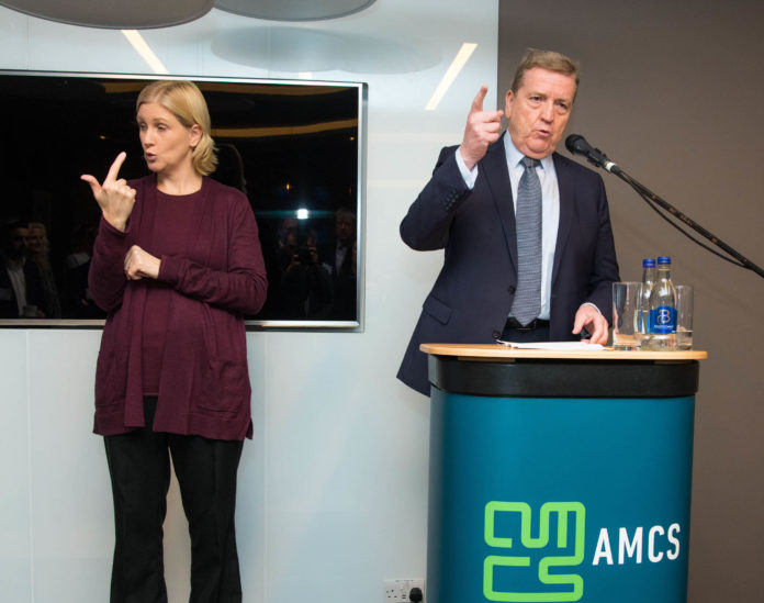 Pointing the way ....... Minister of State Pat Breen with sign language interpreter Carri O'Donnell at the opening of the new AMCS headquarters in Limerick. Photo: Diarmuid Greene