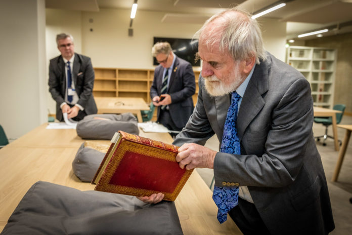 18 Limerick Civic Trust handing important papers to the Glucksman Library, University of Limerick by Edmund Earl of Limerick received by Dr Des Fitzgerald, President of the University of Limerick. Pictured is Tony Cahill, retired Professor from University of Limerick. Picture: Keith Wiseman