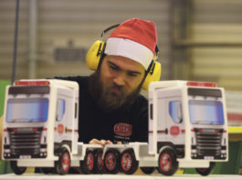 A member of the Sisk carpentry unit putting the finishing touches to toy trucks before dispatch to the Children's Ark at University Hospital Limerick.