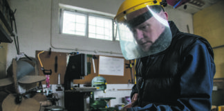 A member of the Shannon Men's Shed working on some wood turning. pic: Cian Reinhardt