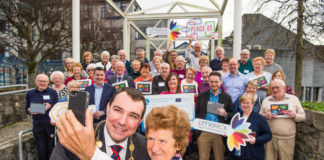 Mary Cronin, from Croom, Chair of the Limerick and National Network of Older Peoples' Councils, taking a selfie with Cllr James Collins, Mayor of Limerick City and County. Photo by Diarmuid Greene