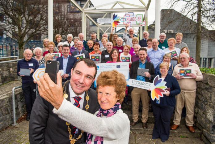 Mary Cronin, from Croom, Chair of the Limerick and National Network of Older Peoples' Councils, taking a selfie with Cllr James Collins, Mayor of Limerick City and County. Photo by Diarmuid Greene