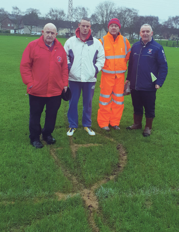 Cllr Kieran O'Hanlon with members of the Geraldines Soccer Club at their pitch in Garryowen.