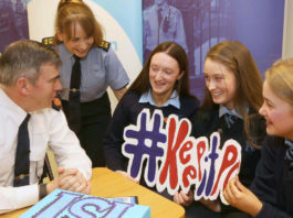 Young Social Innovators students from Ardscoil Mhuire, Corbally with Garda Commissioner Drew Harris and Community Garda Lisa Griffin. Photo: Derek Speirs