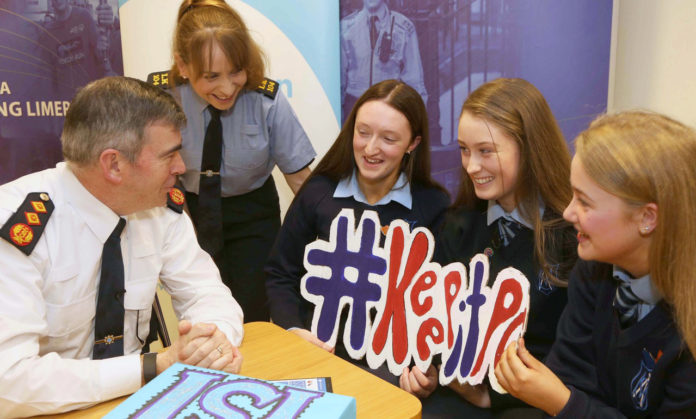 Young Social Innovators students from Ardscoil Mhuire, Corbally with Garda Commissioner Drew Harris and Community Garda Lisa Griffin. Photo: Derek Speirs