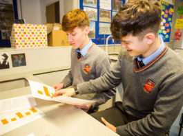 Eoin Hayes and Andre Birdthistle with their project researching electric care usage in Ireland. Pic: Cian Reinhardt