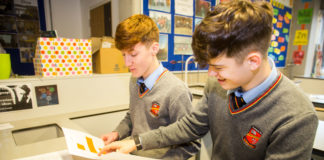 Eoin Hayes and Andre Birdthistle with their project researching electric care usage in Ireland. Pic: Cian Reinhardt