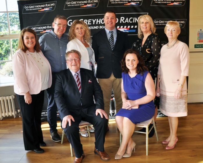 Bob Shanahan celebrates receiving the Special Merit award with his family at the 2018 National Greyhound Racing Awards in Naas, Co. Kildare