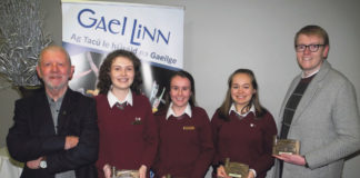 Pictured are the victorious Laurel Hill Secondary School senior debating team, (centre, l-r ) Karin Ní Mhásúin, Rachel Ní Mhuirí and Aisling Ní Dhomhnaill, who took the senior title at the Regional Final of the Gael Linn competition, Comórtas an Phiarsaigh 2019, along with Gael Linn representative, Gerry Motherway ( left ) and teacher James Kelly ( right )