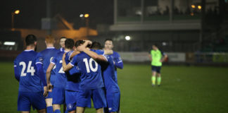 Conor Ellis celebrates with teammates after scoring Limerick's second goal of the game. Photo: Cian Reinhardt