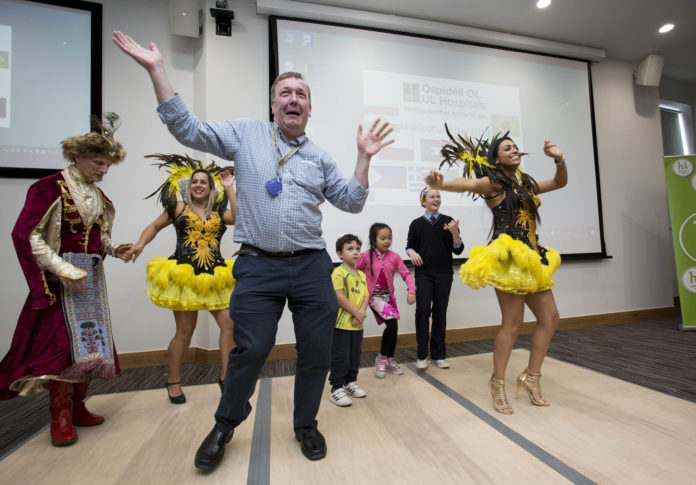 Paediatric Consultant John Twomey joins in a Samba dancing lesson given by Brazilian clinical student Nina Smalle at the multicultural day in UHL. Photo: Alan Place