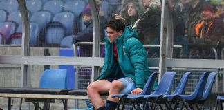 Joey Carbery of Munster sits on the bench after being substituted with an injury during the Heineken Champions Cup Quarter-Final match between Edinburgh and Munster at BT Murrayfield Stadium in Edinburgh, Scotland. Photo by Brendan Moran/Sportsfile