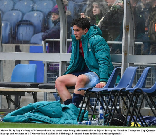 Joey Carbery of Munster sits on the bench after being substituted with an injury during the Heineken Champions Cup Quarter-Final match between Edinburgh and Munster at BT Murrayfield Stadium in Edinburgh, Scotland. Photo by Brendan Moran/Sportsfile