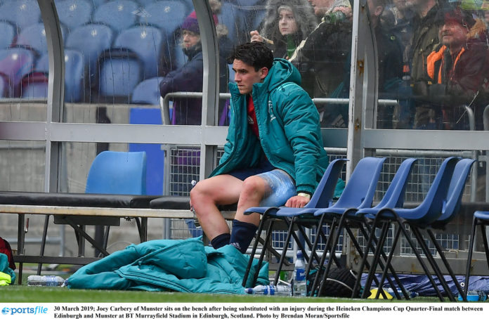 Joey Carbery of Munster sits on the bench after being substituted with an injury during the Heineken Champions Cup Quarter-Final match between Edinburgh and Munster at BT Murrayfield Stadium in Edinburgh, Scotland. Photo by Brendan Moran/Sportsfile