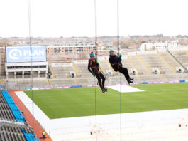 Angela Collins O'Mahony abseiling from the roof of Croke PArk with her daughter Martina.