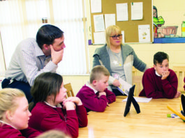 Ann Boland presenting a defibrillator to Corpus Christi school in Moyross. Photo: Cian Reinhardt