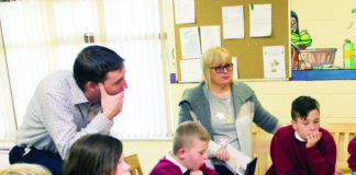 Ann Boland presenting a defibrillator to Corpus Christi school in Moyross. Photo: Cian Reinhardt