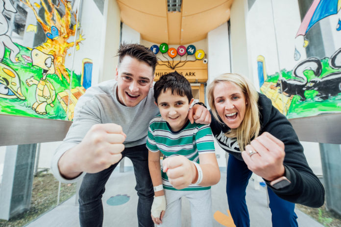 Hoh Henry Shine O Meara age 11 pictured as Munster Rugby Player Ronan O Mahony and International Rugby Referee Joy Neville were announced as the new Childrens Ark Ambassadors . Pic. Brian Arthur